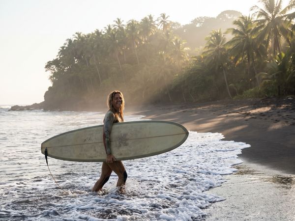 Morning surf on a black-sand beach in El Salvador