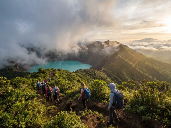 Hikers approaching a volcano crater in El Salvador