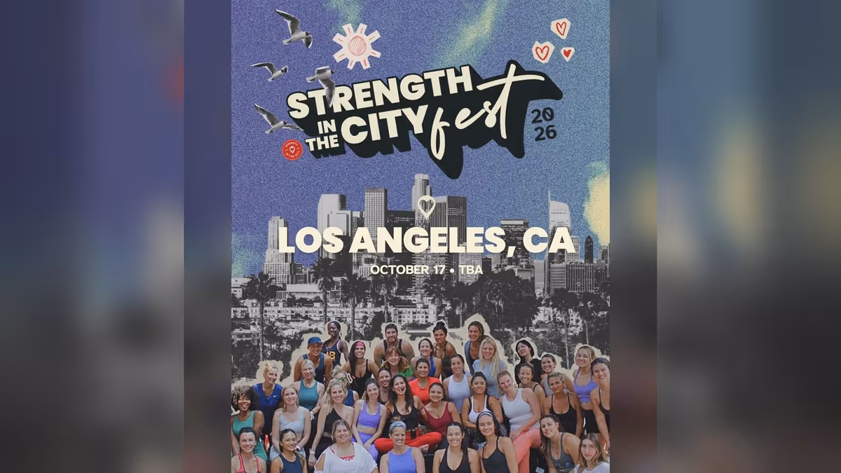 Promotional flyer from the organizer: STRENGTH IN THE CITY fest 2026 in cream lettering over a blue sky with gulls, a sun and hearts, a black-and-white Los Angeles skyline with palm trees, the words LOS ANGELES, CA and October 17 TBA, and a group of smiling people in workout clothes along the bottom