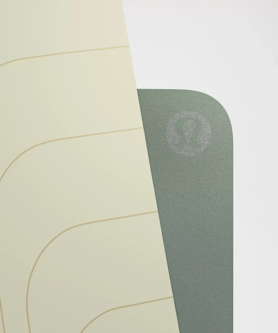 Close-up of the lululemon Align mat: polyurethane top layer with the embossed logo on the rubber base